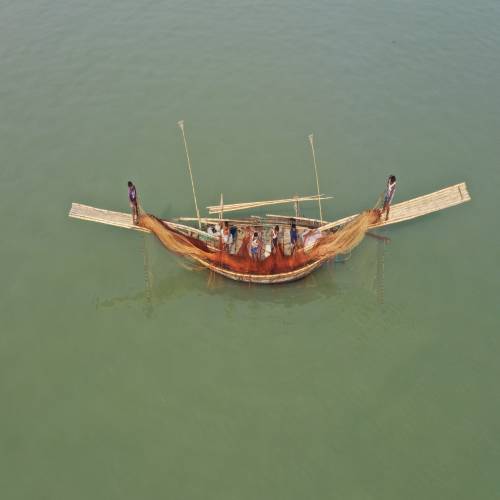 xFishery working with farmers in the field